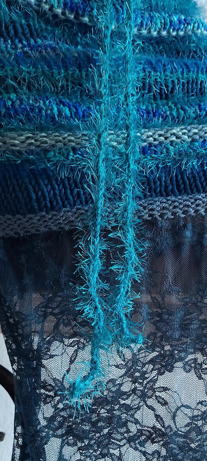 Hand-knitted wool skirt with lace overlay